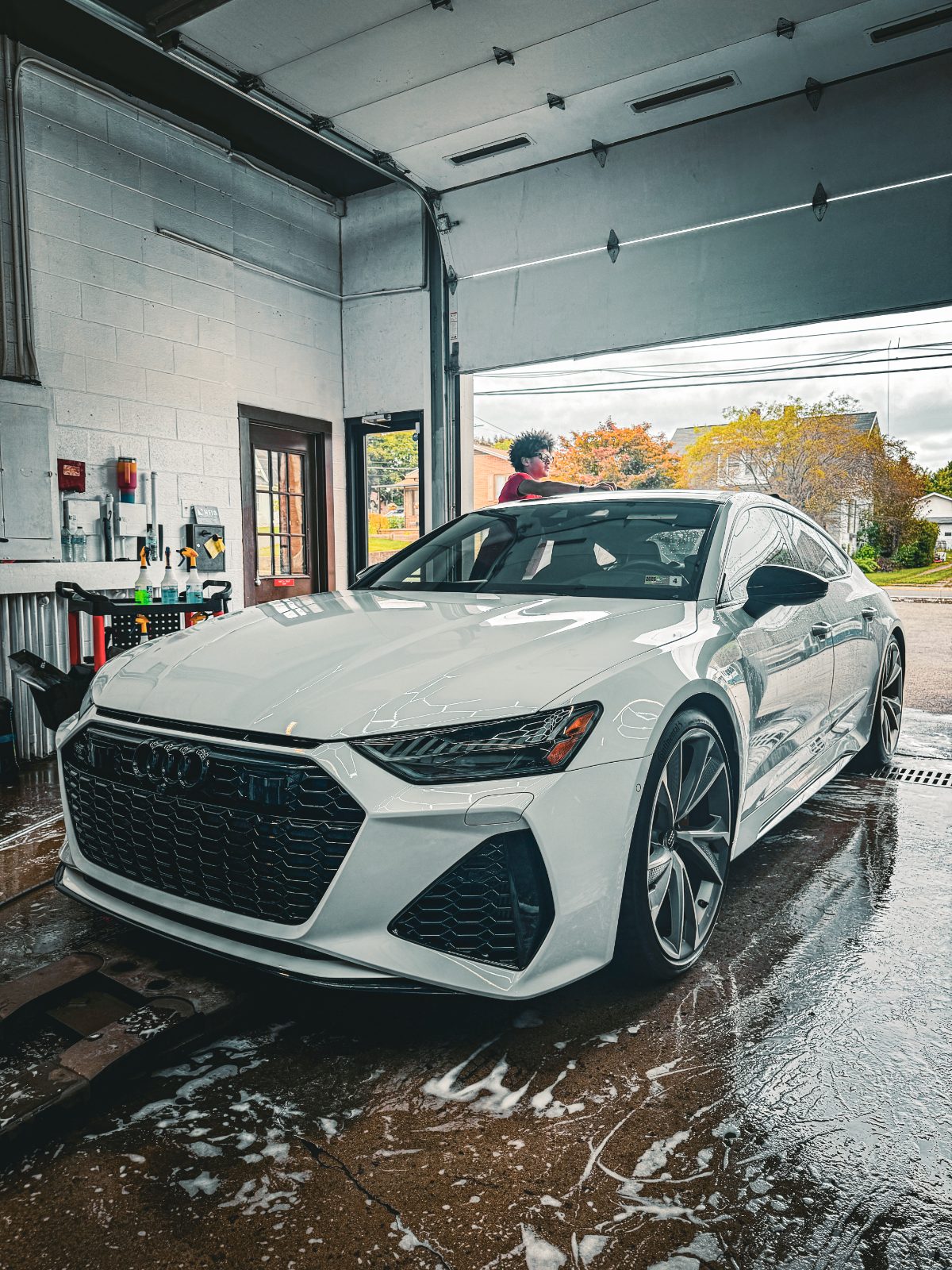 White Audi RS7 during wash and decontamination