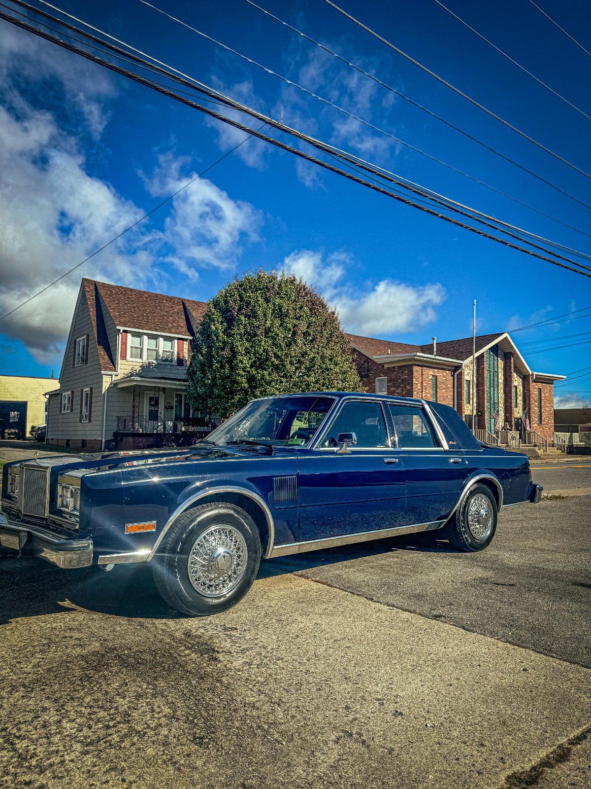 Classic dark blue Chrysler Fifth Avenue after detail